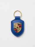 Porte-clés Porsche en cuir Bleu avec écusson en métal doré